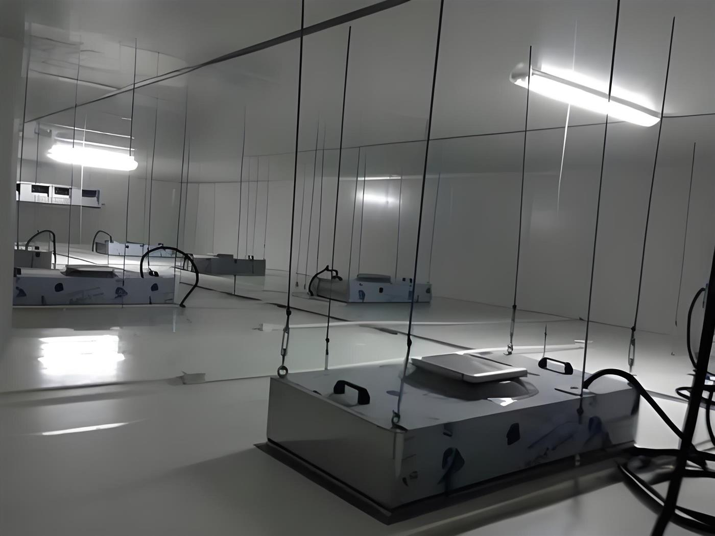 FFU ceiling service layer above a cleanroom with fan filter units and suspended ceiling structure